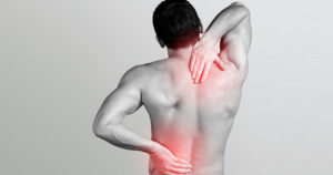 Man with neck and back pain at wow chiropractic and acupuncture in lutherville-timonium and hanover maryland